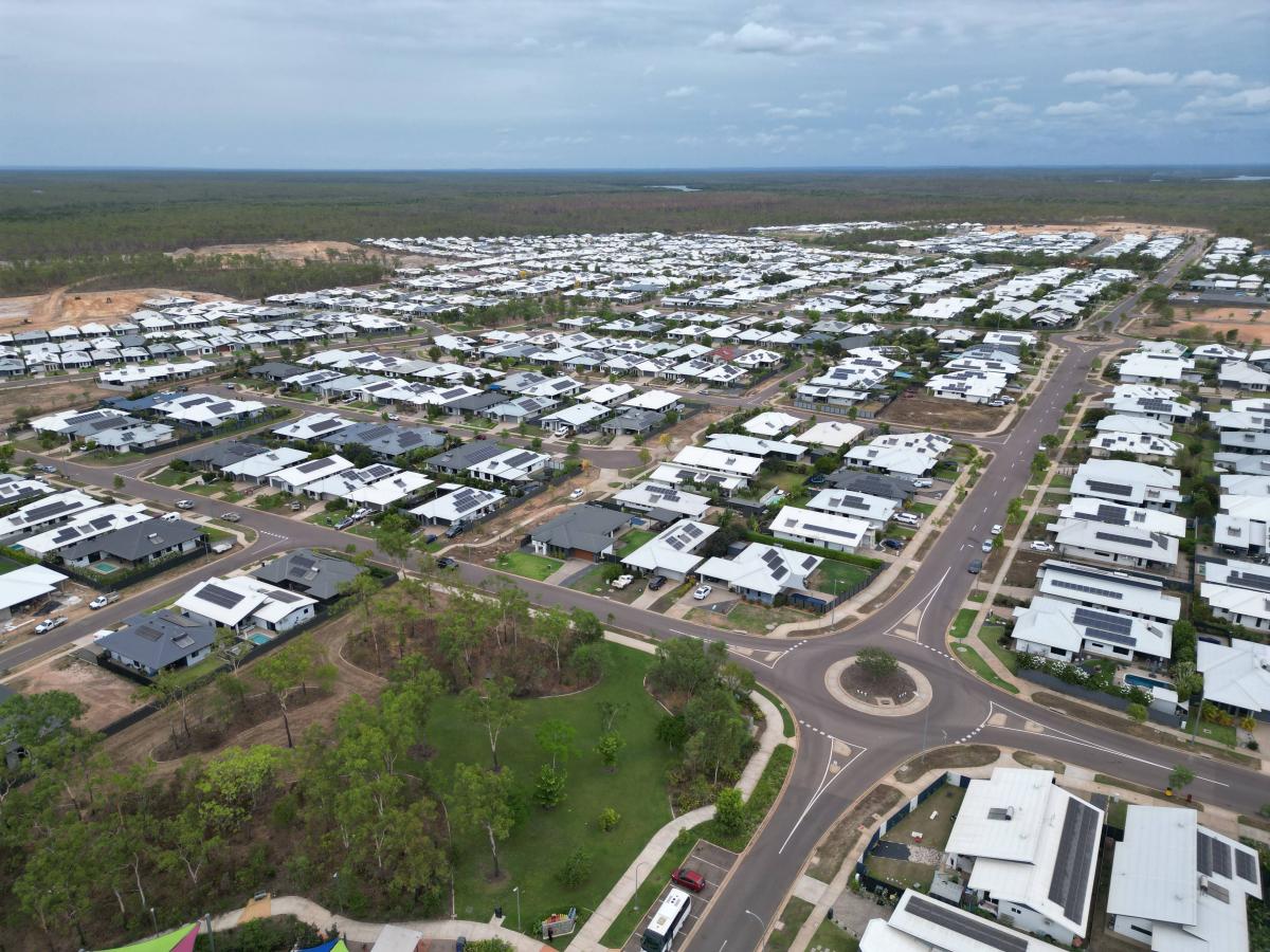 Aerial view of Zuccoli Village showing established residential streets, housing and surrounding green space in Darwin
