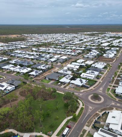 Aerial view of Zuccoli Village showing established residential streets, housing and surrounding green space in Darwin